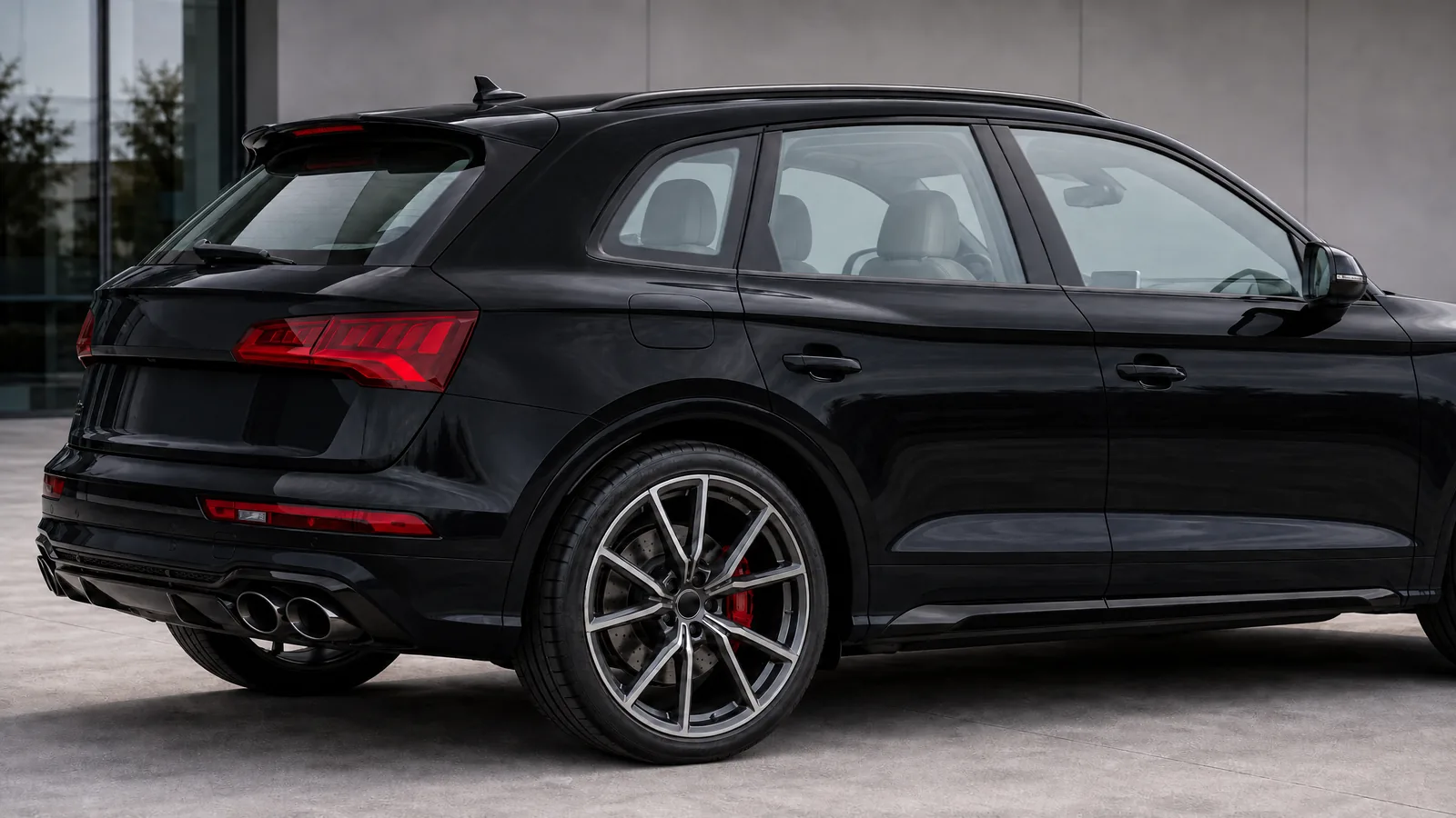 A black Audi SQ5 with clear glass